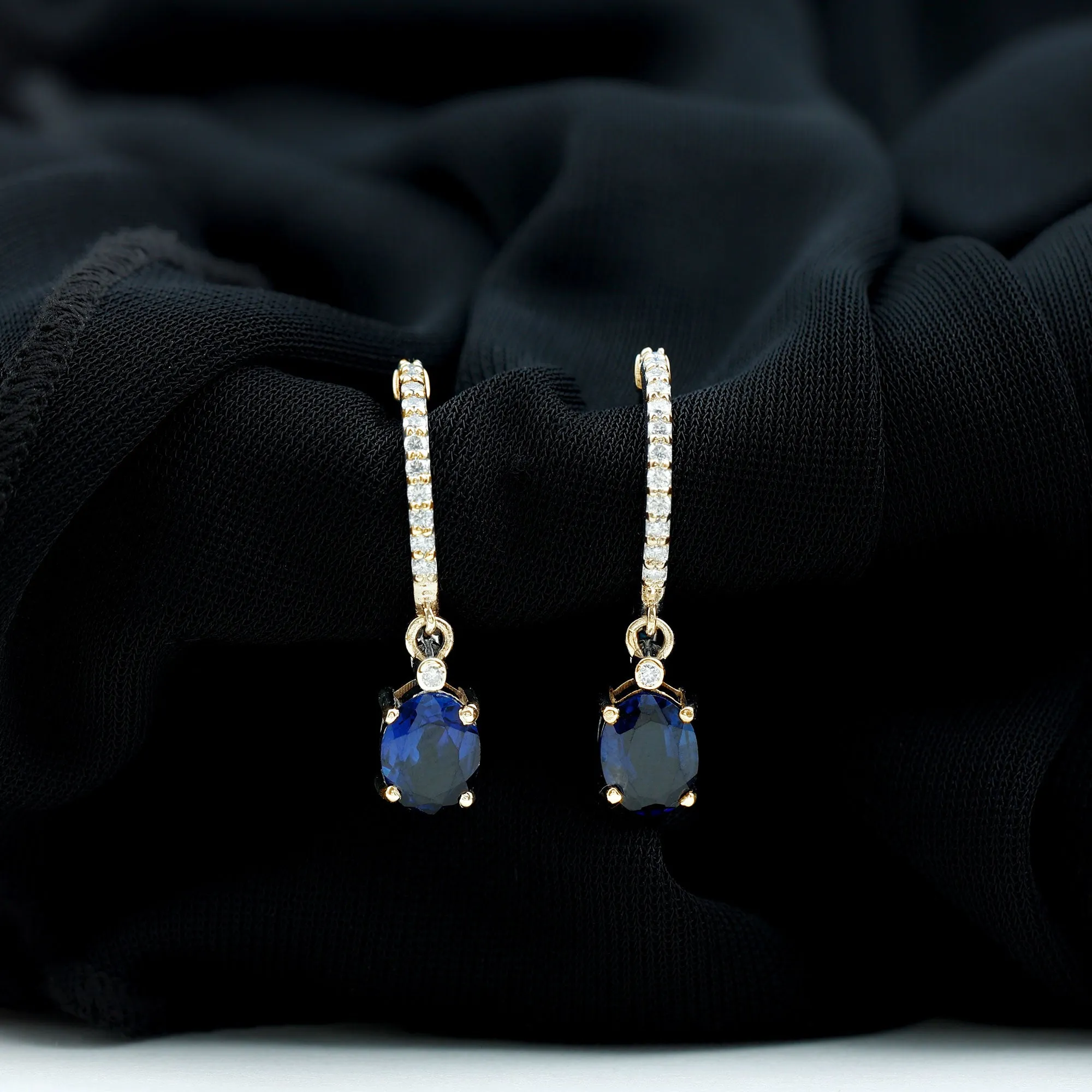 Oval Created Blue Sapphire Hoop Drop Earrings with Moissanite